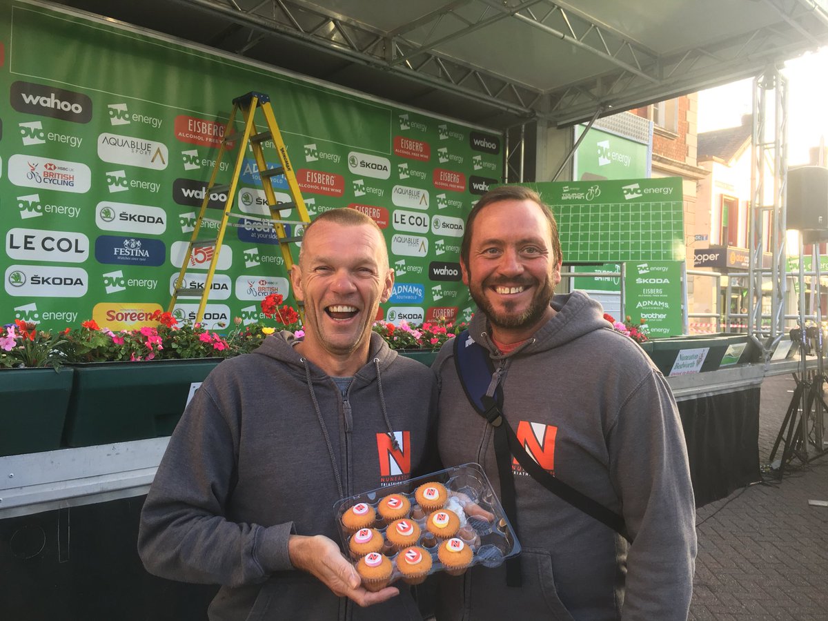 NBBCouncil's tweet photo. So @nuneatontriclub were here at the crack of dawn to welcome @TourofBritain to #Nuneaton. They’ve even baked cakes! #tooexcitedtosleep #OVOToB #NuneatonTOB #spectatorstage https://t.co/IhYNxIsRWd