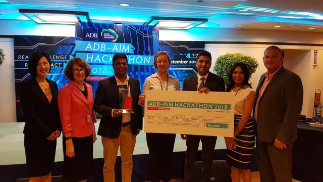 nittanb1's tweet image. Satish Wadhwa, VP &amp;amp; Vertical Head – Banking &amp;amp; Finance Solutions, APJ, Wipro Ltd. handing out the winners cheque to the 1st prize winner of the Digital ID challenge at the #ADBHack2018 bit.ly/2MMxB1Q