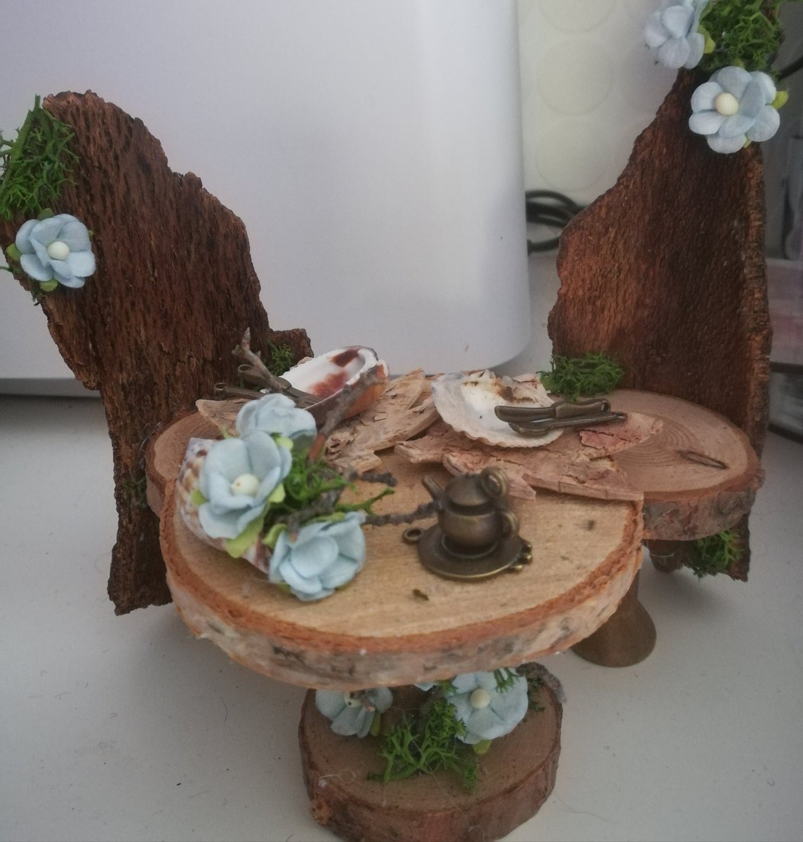 This gorgeous little table and chairs set, is perfect for afternoon tea in any Fairy Garden.
#craftbuzz #shopscotland #smallbiz #Etsy #handmade #fairy #faeries #FairyTail #fairy