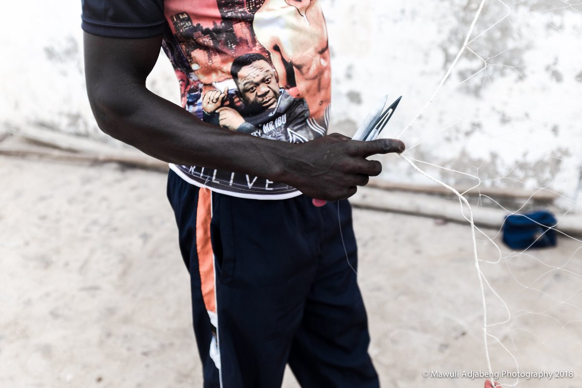 mawuliadjabeng's tweet photo. Kweku, a fisherman mends a fishing net by the Cape Coast Castle - Oguaa, Cape Coast #ghana #fishing #fisherman #mendingnets #livelihood #fujifilm #fujifilmx100s #myfujifilm_sa #peopleandplaces #reportagespotlight #traveljournal #Ghana #Africa @BBCAfrica @ReutersAfrica https://t.co/CTJBGGvhV9