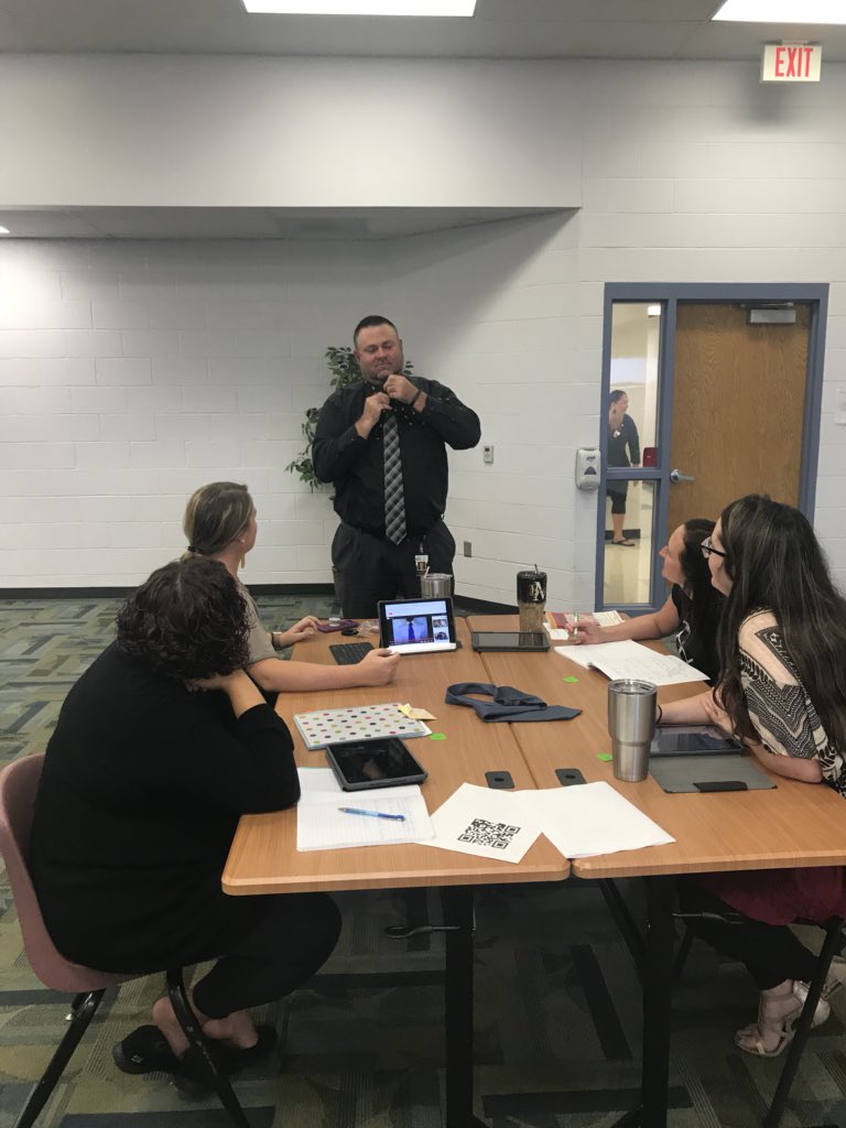 DrJillComstock's tweet photo. Talking assessment in today’s PLC time using ties as an example. This group is happy Dr. Archibald could step in to demonstrate proper technique.   #OrrickBearcats #OrrickPD https://t.co/2dqRQDo70g