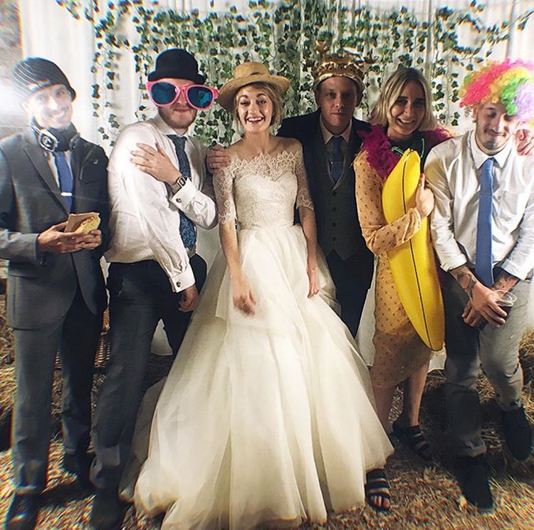 the band and katie at the wedding.