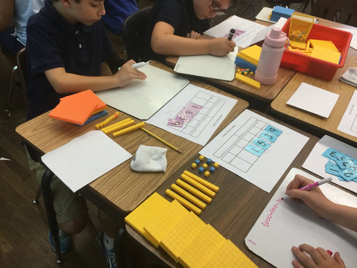 ISMathCDS's tweet photo. Fourth graders learn all about what makes numbers have their value. #CDSlovesmath https://t.co/hqvnkODSxO