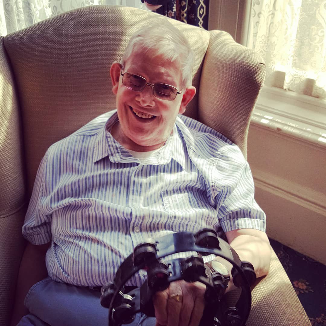 CullifordHouseA's tweet photo. We love #AllenKnott and his wonderful bag of #tambourines 😂 So many happy faces and singing from the heart #CareHomeActivity #DorchesterDorset https://t.co/hwCyhTvaCD