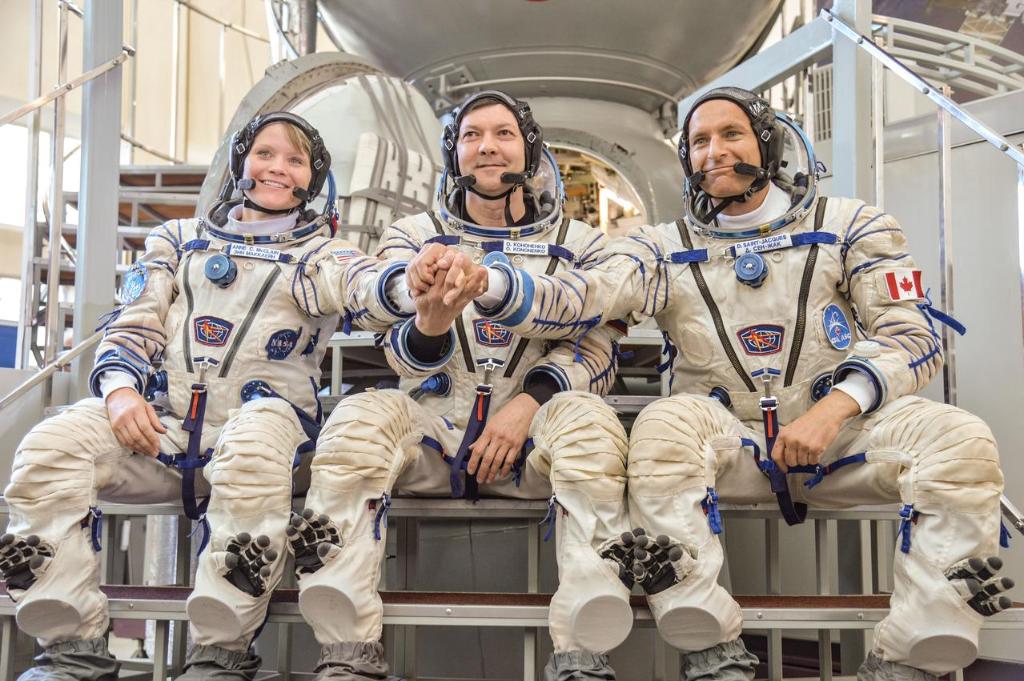 NASA's tweet image. Which three lucky humans will soon blast off Earth this December to spend six months living &amp;amp; working in space? Meet the next crew launching to the @Space_Station on Thursday, Sept. 6 at 2pm ET. Tune in, watch and ask questions with #askNASA. Details: go.nasa.gov/2Q60cNk