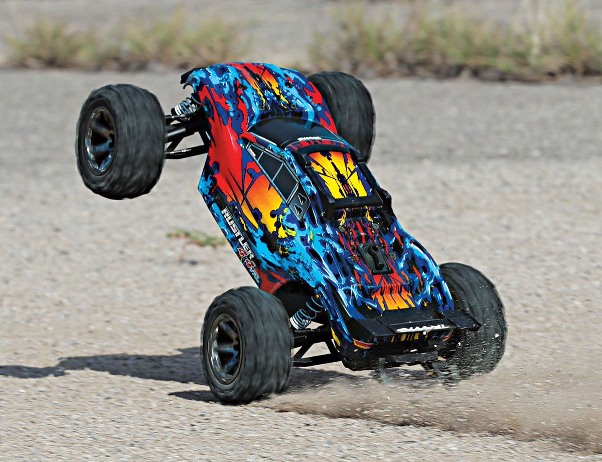 Traxxas's tweet photo. You know what day it is! 
#WheelieWednesday with the #Traxxas Rustler 4X4 VXL 🙌🏼 

The upgraded Revo®-Spec slipper clutch allows for superior power handling and MORE ::: https://t.co/Rh1H8nhTv3 

#FastestNameInRadioControl #TraxxasWheelie https://t.co/LV9cwRWjMm