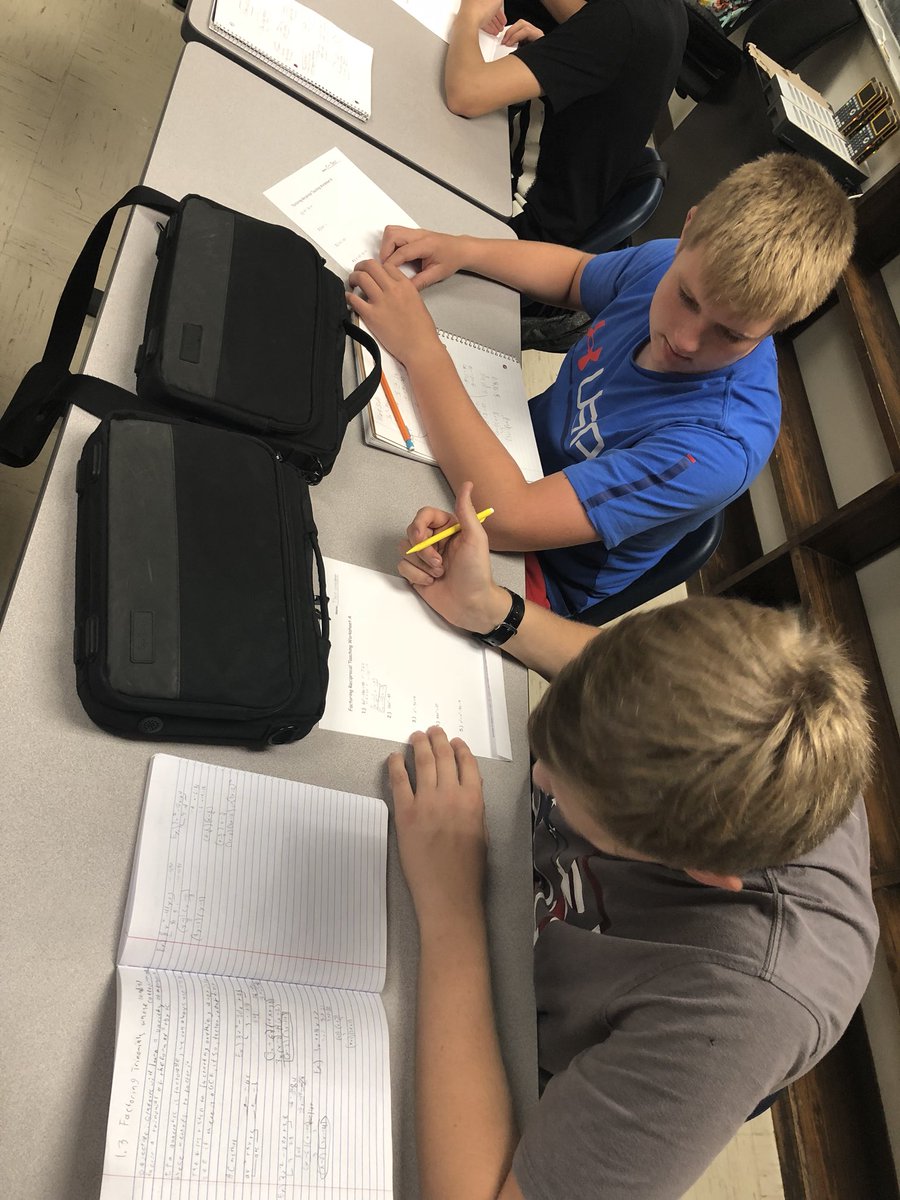 Mr. Petty’s high school math class strengthening their math skills by using reciprocal teaching and coaching each other up! Great math conversations! #rebelsr3pride