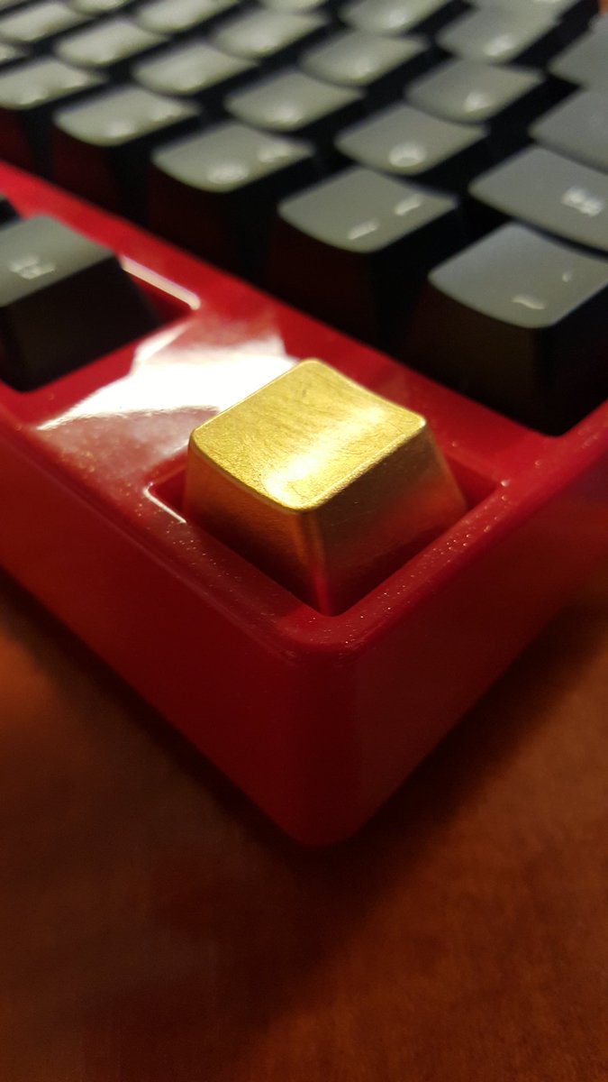 WritingMachines's tweet image. So cool! When I recently got my new #Filco keyboard, MechanicalKeyboards.com (@MKeyboards) included this awesome gold keycap, which I've used to replace the Esc key. It's like my keyboard has a gold tooth!