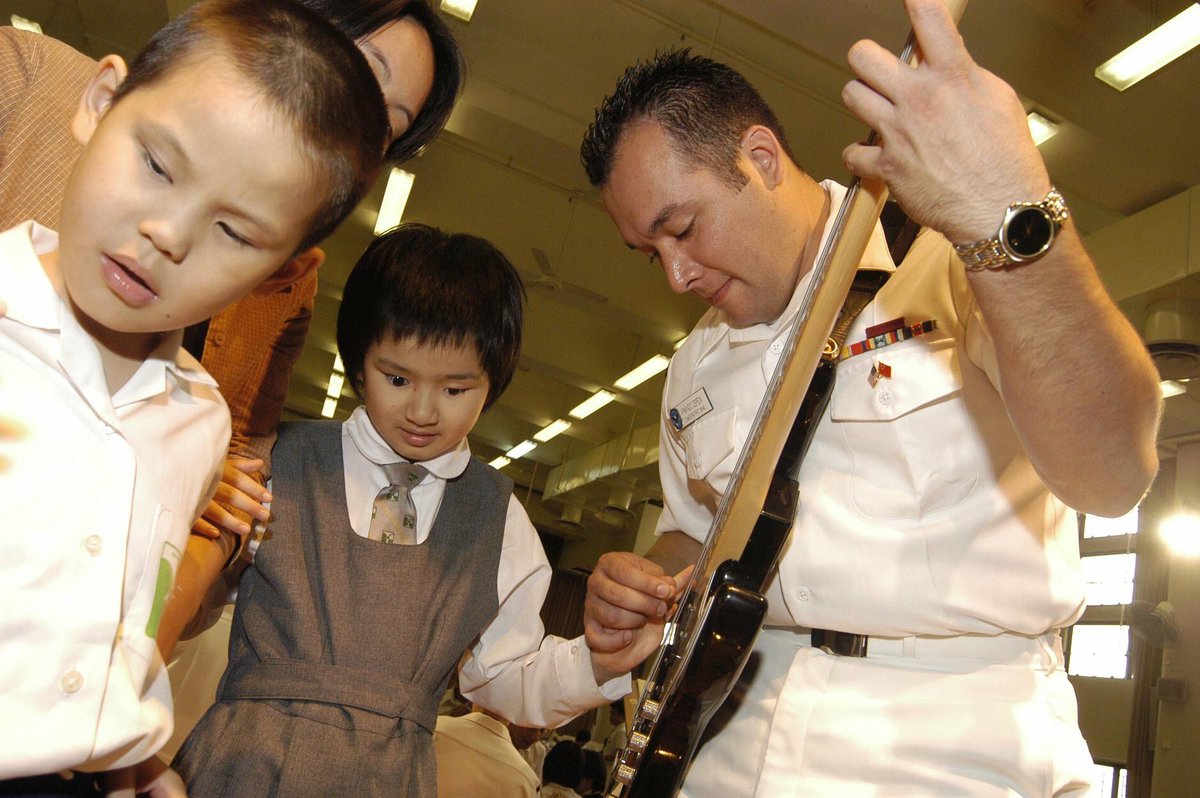 NavysFlagship's tweet image. #ThrowbackThursday to 2003 when the 7th Fleet band Orient Express played a concert for students from the Ebenezer School for the Visually Impaired during a Blue Ridge port visit in Hong Kong. #FinestintheFleet #NavysFlagship #ussblueridge #lcc19