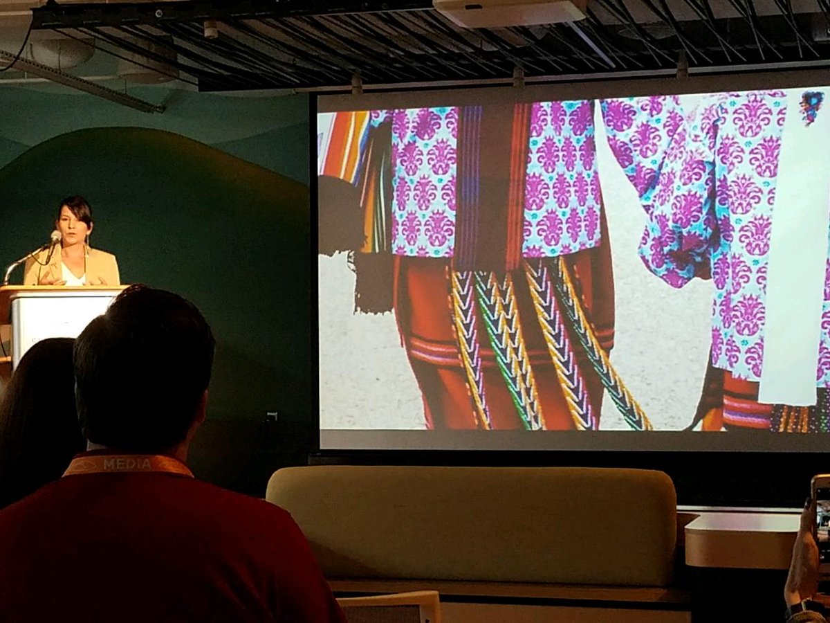 rmero's tweet image. Addie Roanhorse of the Osage Nation with a photo of her and her daughter depicting a traditional fingerweaving design that informed her work, the first commissioned art for @themomentary in Bentonville. Her patterns will be etched into the building's glass and facade.