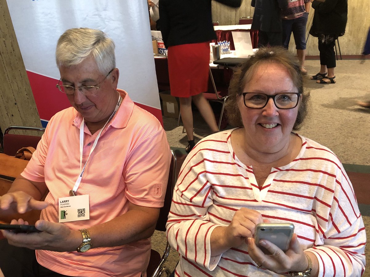 lessulgrove's tweet photo. Polly and Larry Pickering preparing to sweep the purchases at the IAR Realtor Foundation Auction. #iarconv - https://t.co/DyngJp9u6D https://t.co/Hhkm3j4RnU