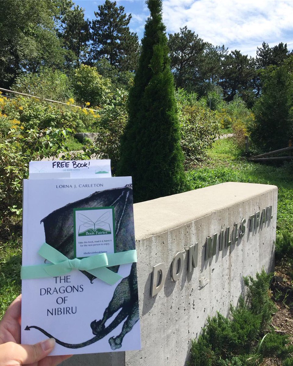 BookFairies_TO's tweet photo. This signed copies of Canadian author, Lorna J. Carleton’s The Dragons of Nibiru 🐉 is waiting at the Scarsdale entrance to the Don Mills Trail.
#ibelieveinbookfairies
#thedragonsofnibiru #lornajcarleton #dragonsofnibiru #fantasybooks https://t.co/4b6YV9EbMC