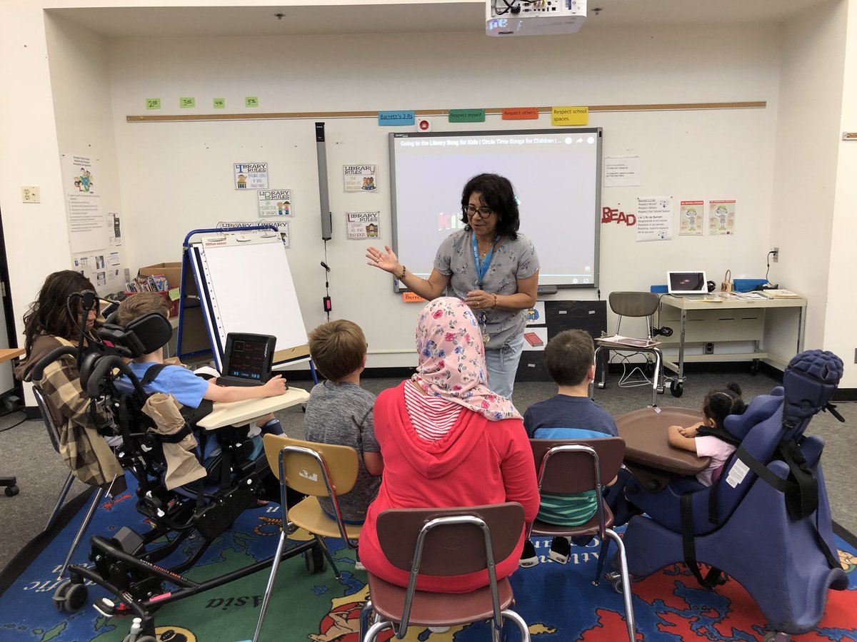 Students &amp; teachers singing and clapping Hello in the library #song #greeting #KWBPride #APSBack2School @KWBLibrary <a href="/KWBHalliganFLS/">Elizabeth Halligan</a>