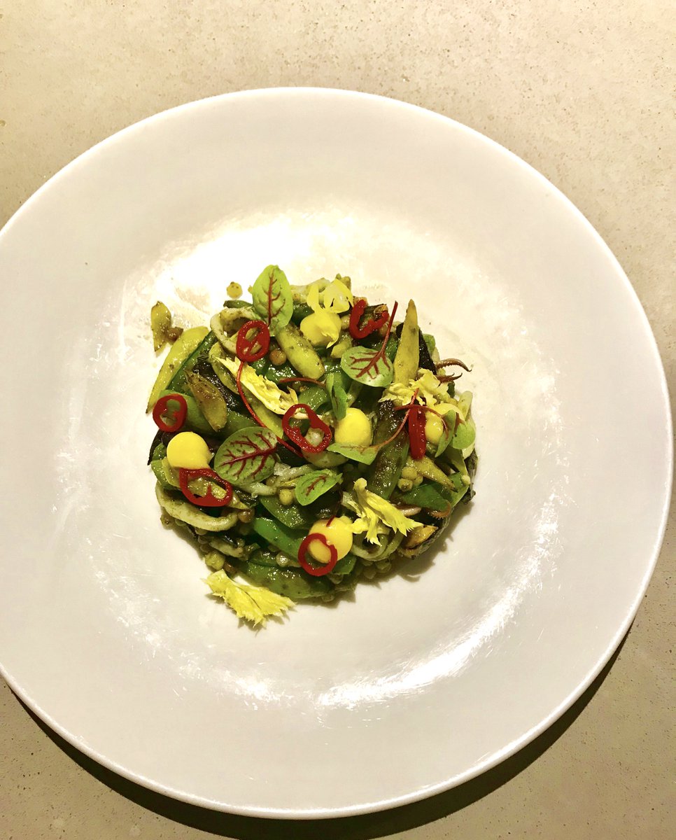 Sautéed squid with snow peas, celery, harissa &amp; couscous <a href="/vernickphilly/">Vernick Food & Drink</a>. Is Vernick in "Unique Eats &amp; Eateries of Philadelphia?" Yes! Read about Greg Vernick's 1st food service job. Bet you can't guess where he started honing his talent.