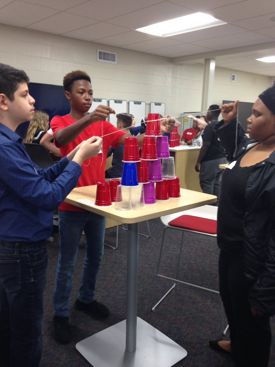 OTooleMath's tweet photo. Algebra 1A: building towers of cups using rubber bands. #GBHSBestFirstDay #teamwork #perseverance https://t.co/PPD7ucw150