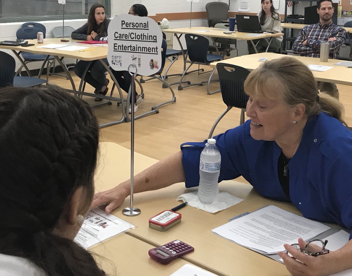 CTE4CCPS's tweet image. Juniors in their @CCPSEVHS Economics and Personal Finance class are getting a glimpse of their future through “Reality Store.” Spin the “Wheel of Life” to experience the unexpected! #brokenwindow #vetbill #taxreturn #flattire