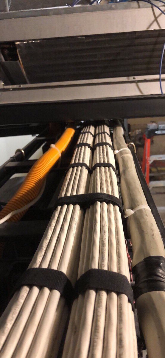 1st_sky_captain's tweet photo. I love my job. #datatech #cat6a #datacloset https://t.co/uVXRBvWU6G