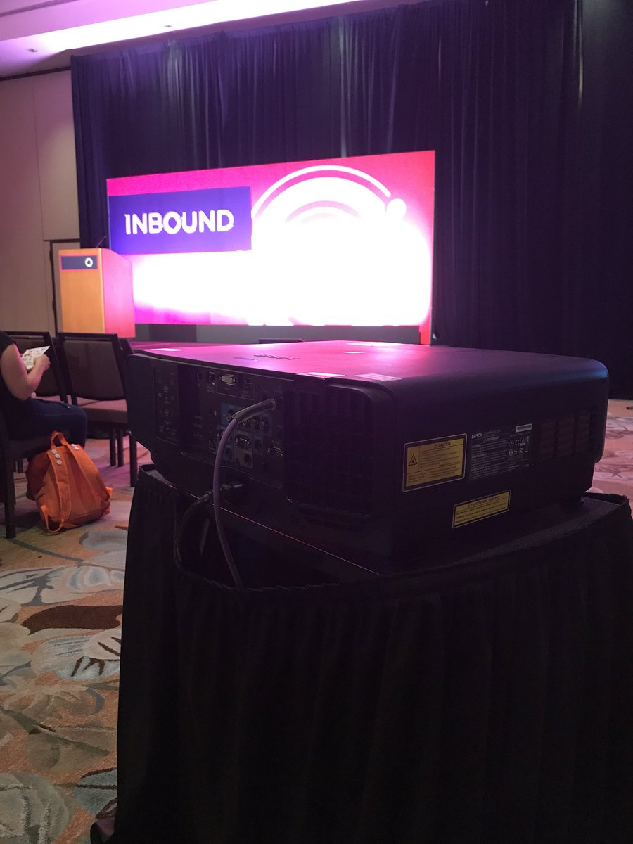 ContentRachel's tweet photo. Anyone else freezing inside at #Inbound2018? I’m sitting by this projector in Harbor 2 and sneaking a little heat off the projector fan. #tips https://t.co/e5USzeeONo