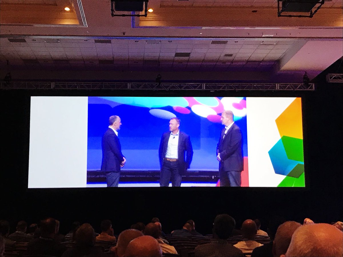 Presidio's tweet photo. CEO Bob Cagnazzi (@bcagnazz) welcomes Chris Barney (@cbarney6) of RedSky (@goredsky) and Jamie Anderson (@jamieand78) of Emergent Networks (@Emergent_NOC) to the @Presidio team at Exchange18! #FutureBuilt https://t.co/kH4V0LaUmP