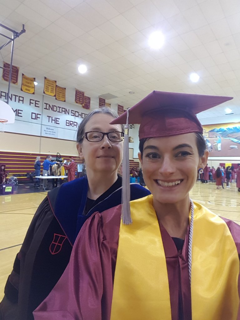 FightingTuition's tweet photo. #TBT to when @rckchlkjenhawk got her AA at @SFCCNM She is pictured with SFCC ENGL Dpt Chair &amp; fellow Jayhawk, Dr. Deisler. In May J will join the 42% of CC students who finish their BA w/in 6 yrs of starting CC. Starting at a CC can be a great way to save $1000's on your degree https://t.co/e9kHncTXNb