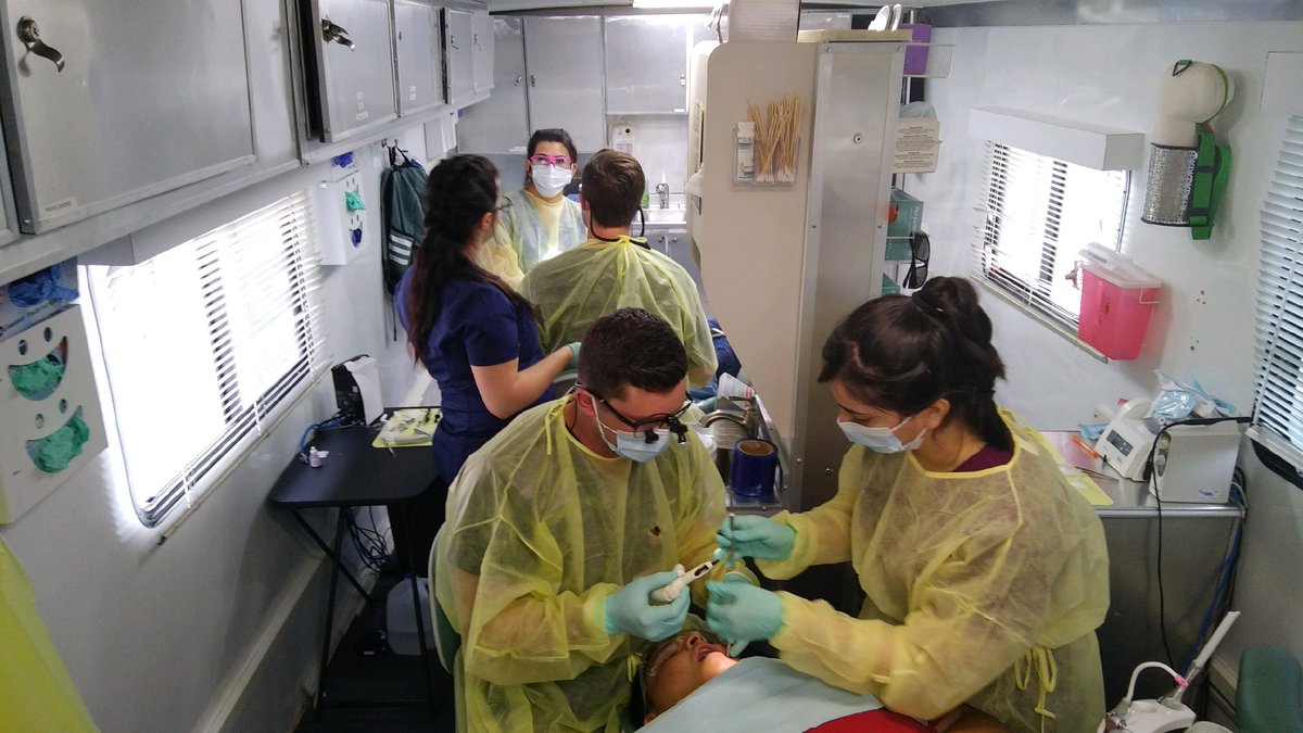 OKDF's tweet photo. Working at US Grant High School today and we have OU College of Dentistry fourth year dental students, Kenyon and Eric, with us! https://t.co/YxBRmqmAOs