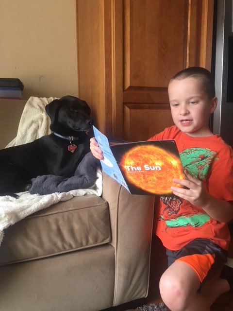 northiesread's tweet photo. A boy, a book, and his dog! Can’t get much better than that on #NationalReadaBookDay and everyday! @JCPSLibraries #JCReads  #Read50 https://t.co/Rap48CXcHt