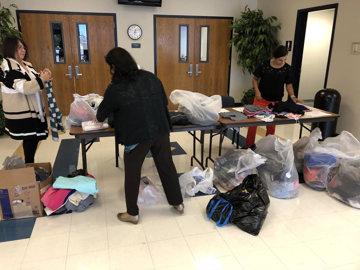 NISDTeachLearn's tweet photo. Just look 👀 at all those donated clothes! The @NISD community has a BIG heart ♥️! #NorthsideThreads #ThisIsNorthside https://t.co/KcdpiVER8p