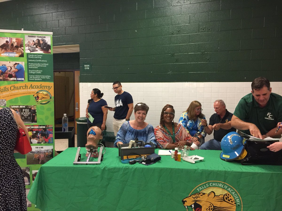 The <a href="/fcacad/">Falls Church Academy</a> table <a href="/FallsChurchHS/">Falls Church HS</a> Back to School Night