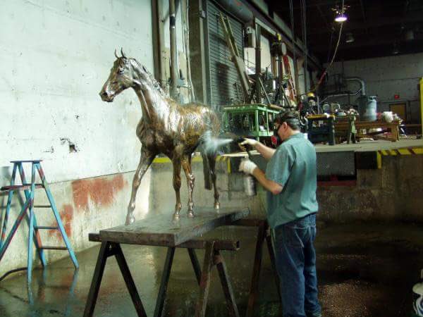 Bronze steeplechaser in the foundry. #saluter #virginiagoldcup #bronzehorse #kyderby #sportingart #triplecrown #horsesculptor