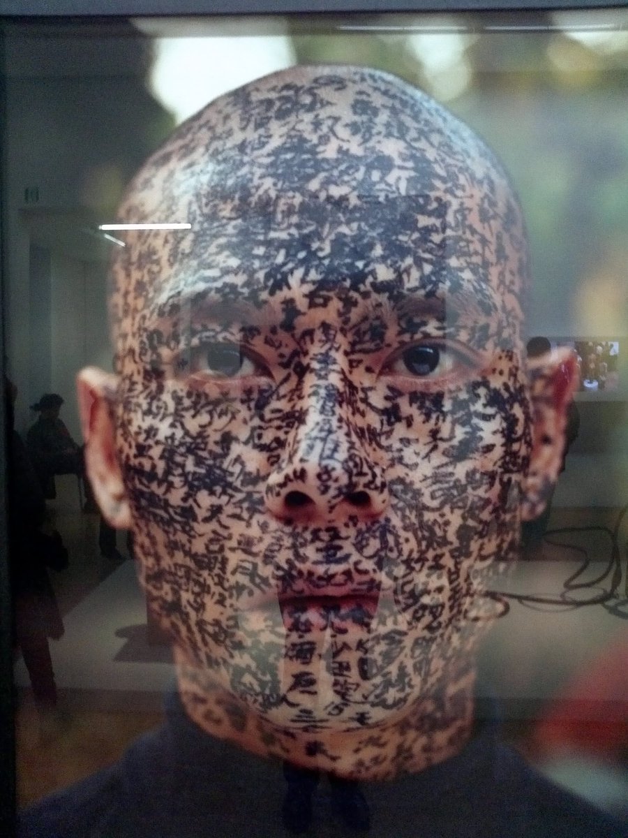 roomeduofficial's tweet photo. Family tree, 2001, Zhang Huan, Center Pompidou. With a family tree, made less than two years after his move to New York, Zhang offered his face as surface in which words, names and stories linked to his cultural heritage are literally written. This work is documented in 9 photos https://t.co/j9Lr1QKl4c