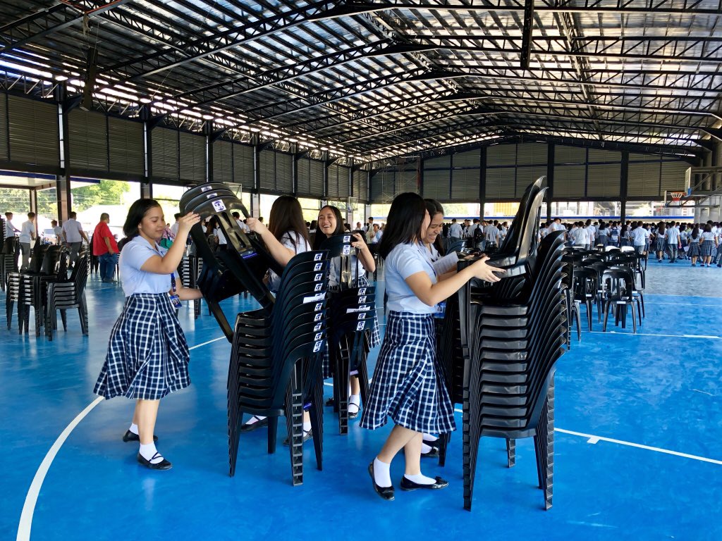 olaaddushs's tweet photo. GRADE 11 | Learners piling up the chairs and doing CLAYGO as they leave the gymnasium. @ashsformation @AdDUSeniorHigh @ecoteneo https://t.co/G8zT6t3vQX