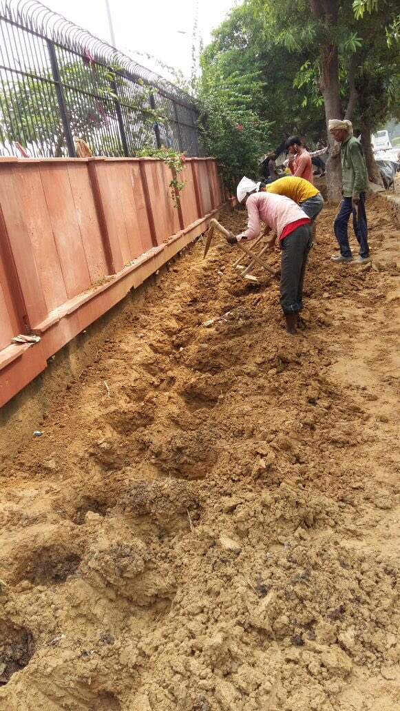 Hole digging process is going on across the National Capital for the tree plantation at different places...