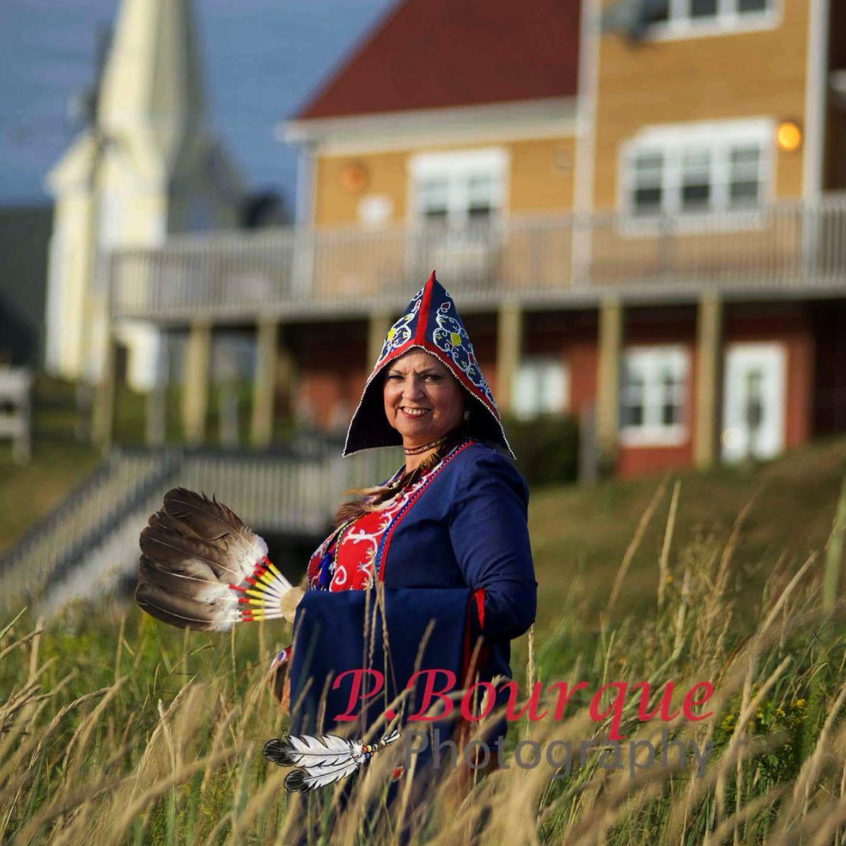 TrishaBourque's tweet photo. Darlene Bernard of Lennox Island First Nation wears a traditional women's #Mikmaq dress. Peeked cap and note the double curve motif.  #pei #Epekwitk #photography #portraits #artist #art https://t.co/mPJqyM5Eyv