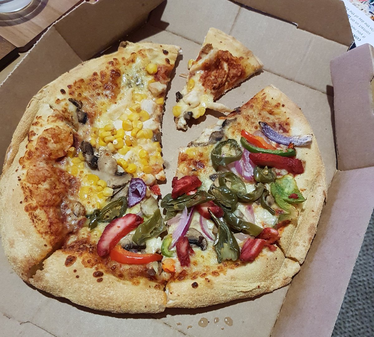 recrispy's tweet photo. The cutting and topping distribution must have been missed at quality control... At least it tastes good! @dominos #hugecrusts https://t.co/YkDIwbXtfJ