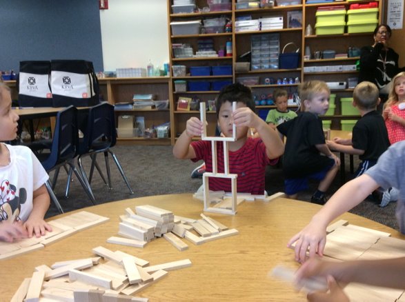 Kindergarteners building with Keva blocks in our new library maker space.