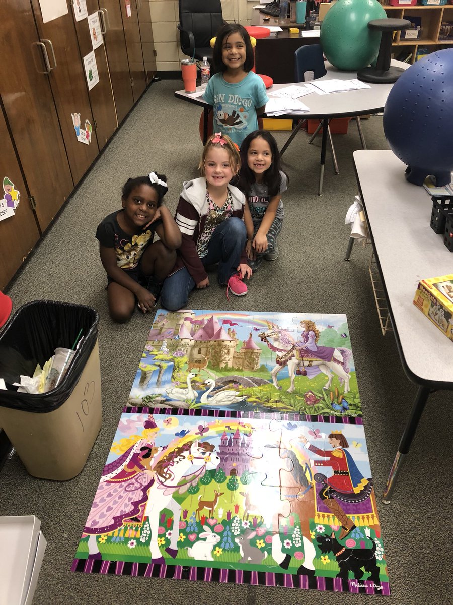 Teamwork during Fun Friday putting puzzles together! #playingislearning #teamwork #FOSTERingLeaders