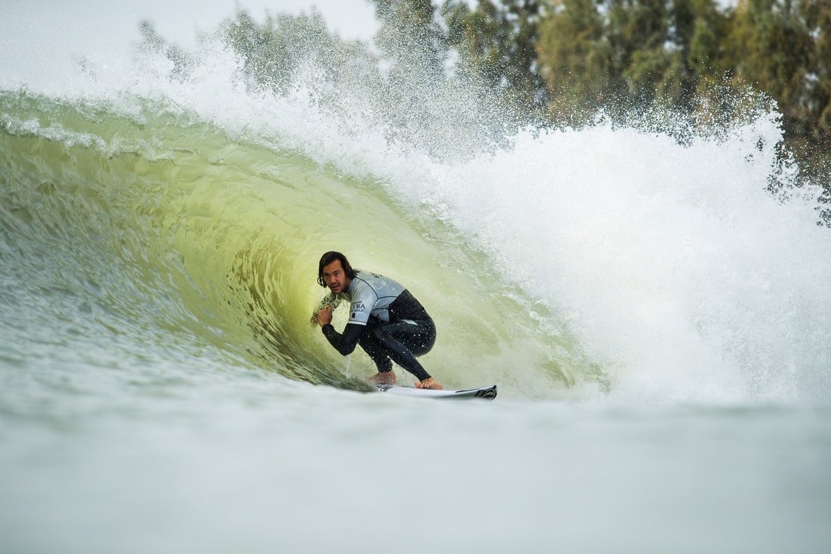 History is made as pro surfers compete at man-made wave pool / Twitter