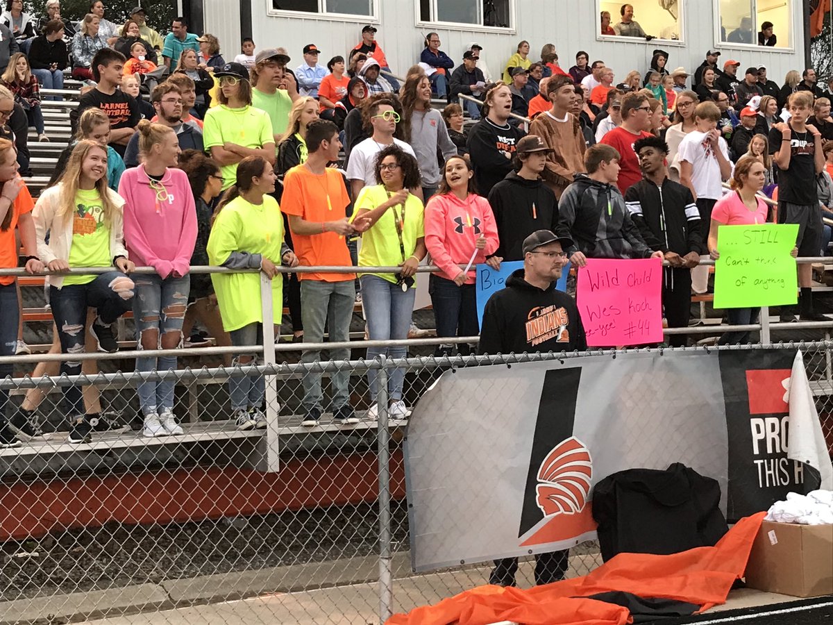 The student section is lit...in neon.