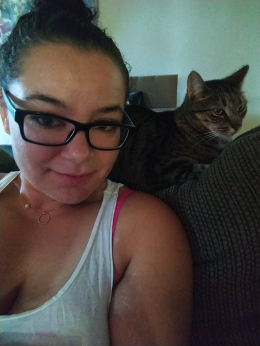 My cat is basically cuddling with me. I can accept this turn of events. https://t.co/i4FaHicp88
