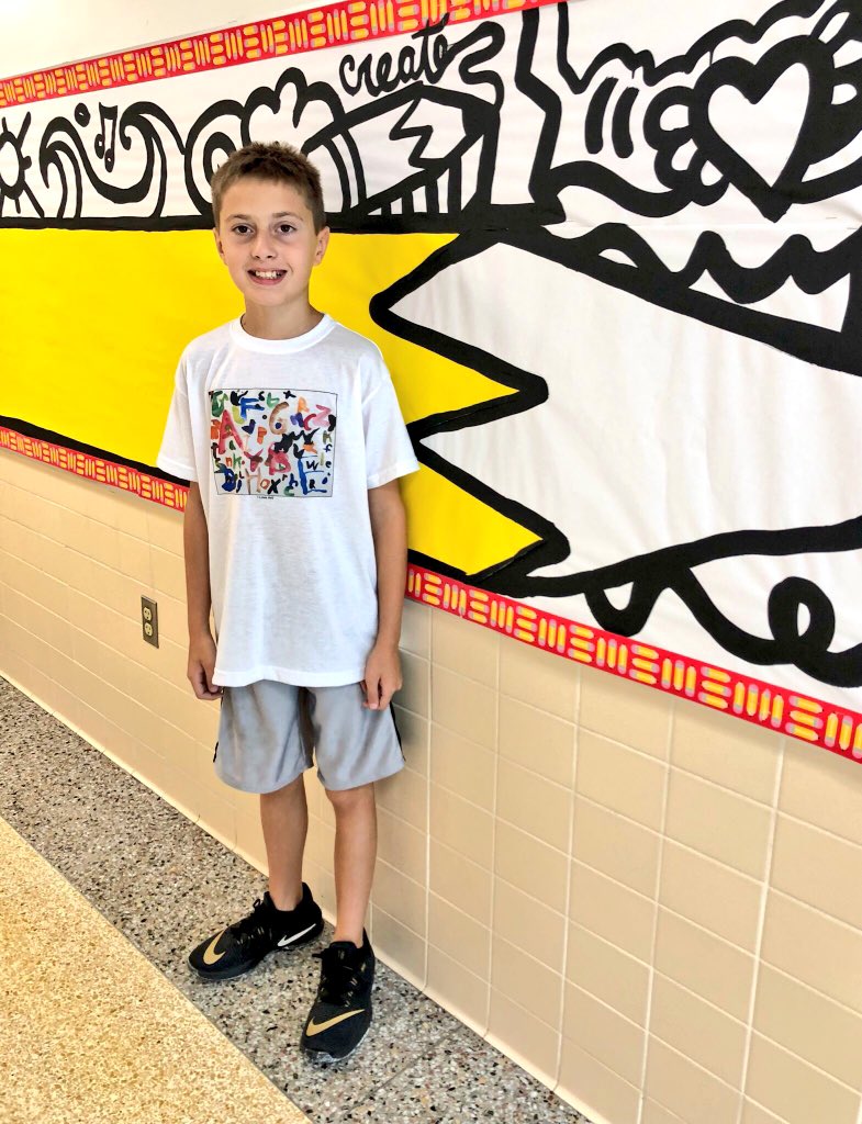 MrsLoucksWY_ART's tweet photo. Trimmer 5th Grade student Cooper Godfrey made my afternoon sporting his “I Love Art!” T-shirt from @Artsonia!  This wearable art is a priceless keepsake that captured his art made from all the way back in 1st grade!   #wyasdesed @MsJLSloan @wyasdblue @Artsonia https://t.co/h1S3D3ikw3