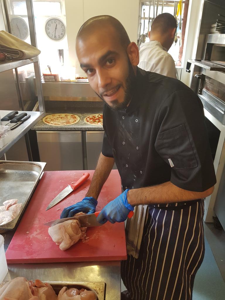 Apprentice chef Mo splitting chickens <a href="/TheGraceGlosRd/">The Grace Bishopston</a> <a href="/petegoodship/">pete</a> @brianho16448477