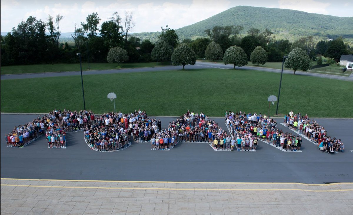 MrsBastressMNMS's tweet photo. All In: EVERYONE gathered to stand for ROAR today! Our massive family photo! #ROARon #familytradition #beautifulMN https://t.co/yHbraYdttM