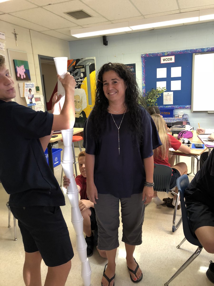 MariaJMorris's tweet photo. A little math estimation and checking in grade 9 yesterday! I’m really not that tall, only 14 and a half when cups are stacked one on top of each other! Hmmm could we stack them differently so I feel taller 🤔 #weekendproblem https://t.co/3flHYu5lM3