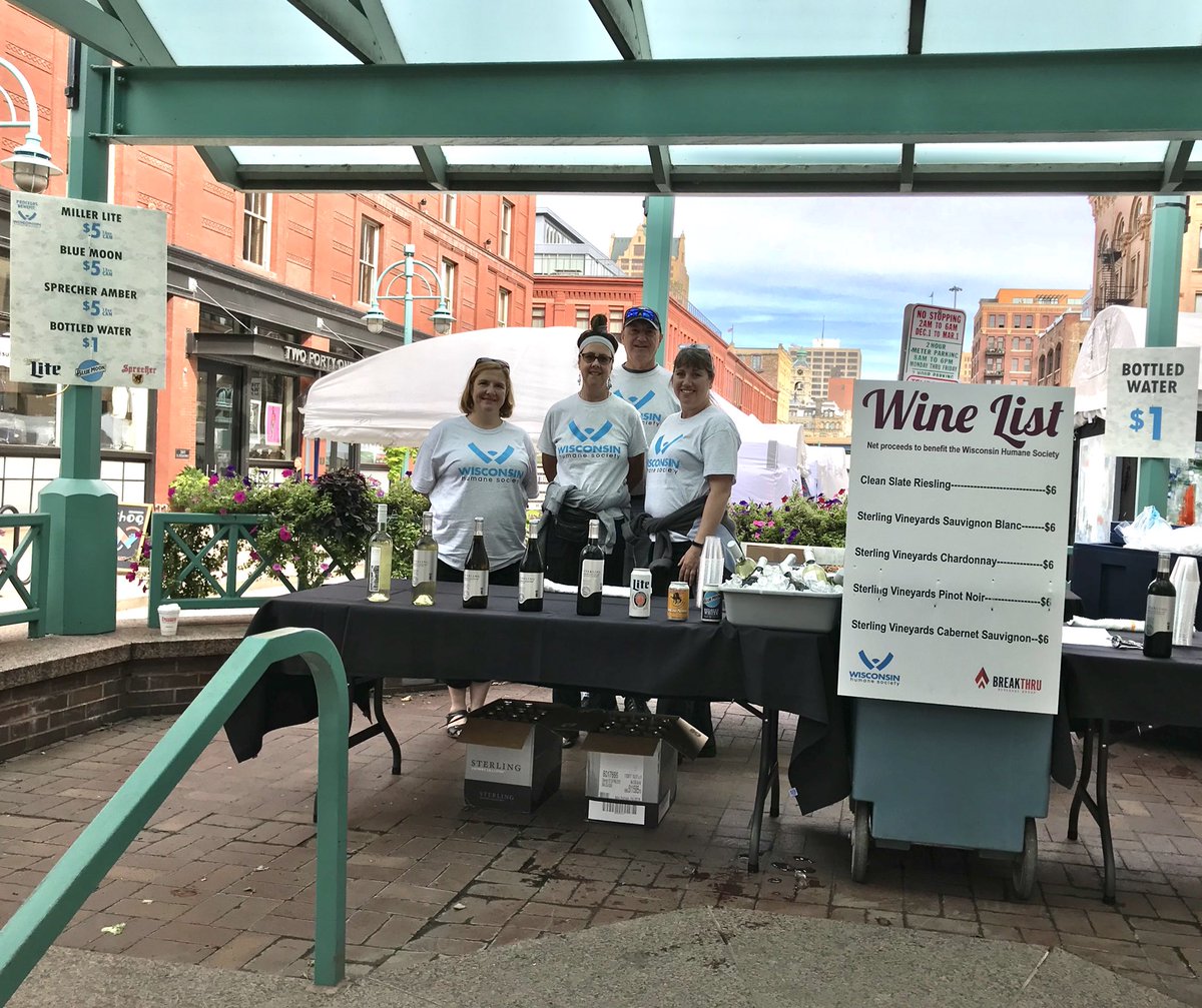 pegsanfelippo's tweet photo. It might be a little cloudy but these fabulous volunteers from the Wisconsin Humane Society will brighten your day! #ThirdWardArtFestival #CupsForPups https://t.co/tlKe95WPCj