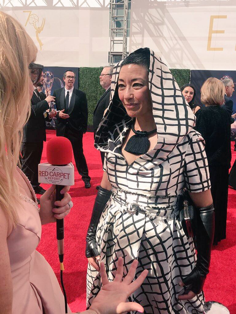 RCRNewsMedia's tweet photo. RCR’s @KristynBurtt is on the #CreativeArtsEmmys carpet! Here interviewing #HandmaidsTale #costumedesigner #anecrabtree @AneCrabtree #Emmys2018 #Emmys70 #Emmys https://t.co/2mANqdhULi