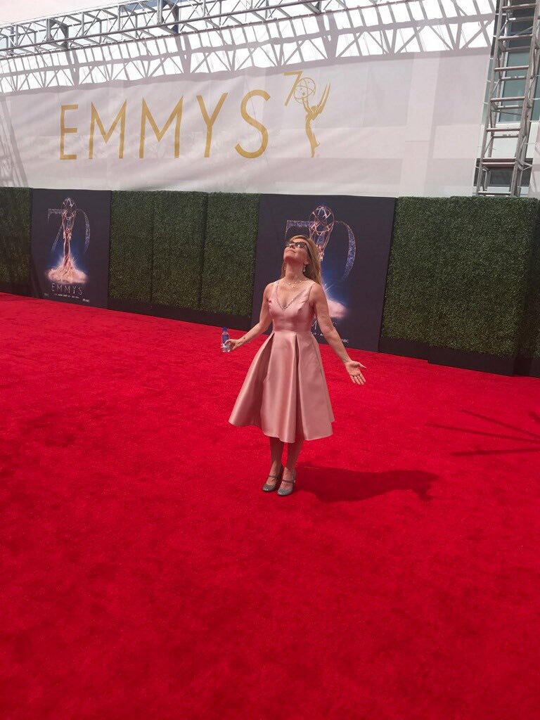 RCRNewsMedia's tweet photo. RCR’s @KristynBurtt is on the #CreativeArtsEmmys carpet! Here interviewing #HandmaidsTale #costumedesigner #anecrabtree @AneCrabtree #Emmys2018 #Emmys70 #Emmys https://t.co/2mANqdhULi