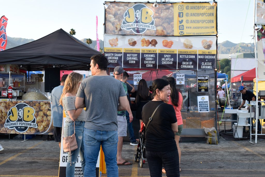 They line up and we serve them the BEST gourmet popcorn on the West Coast!!! Pretty simple right?
**
Who's next to get a bag???