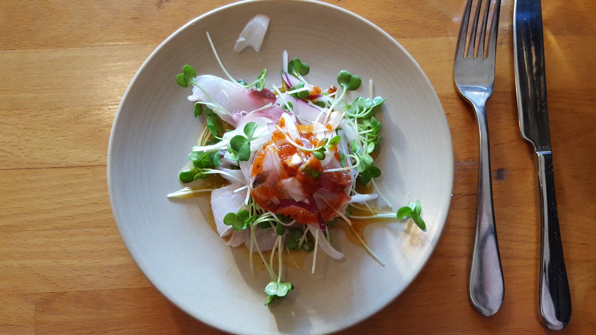 <a href="/scotch1rock/">Hopscotch Oakland</a> #foodie Kanpachi Tiradito, endive, radish sprouts, roasted pepper puree