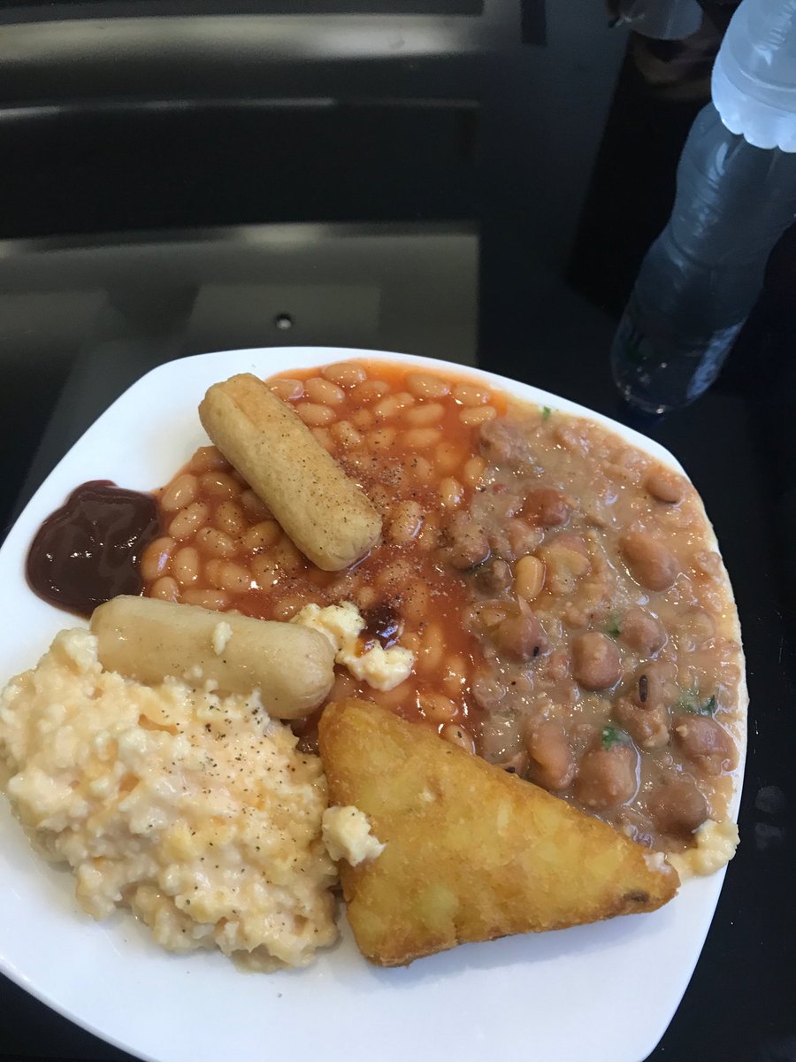 Baddiel's tweet photo. Breakfast in Abu Dhabi Etihad lounge not up to my usual. Should’ve brought Alan’s big plate. https://t.co/Cb41lBDfvP