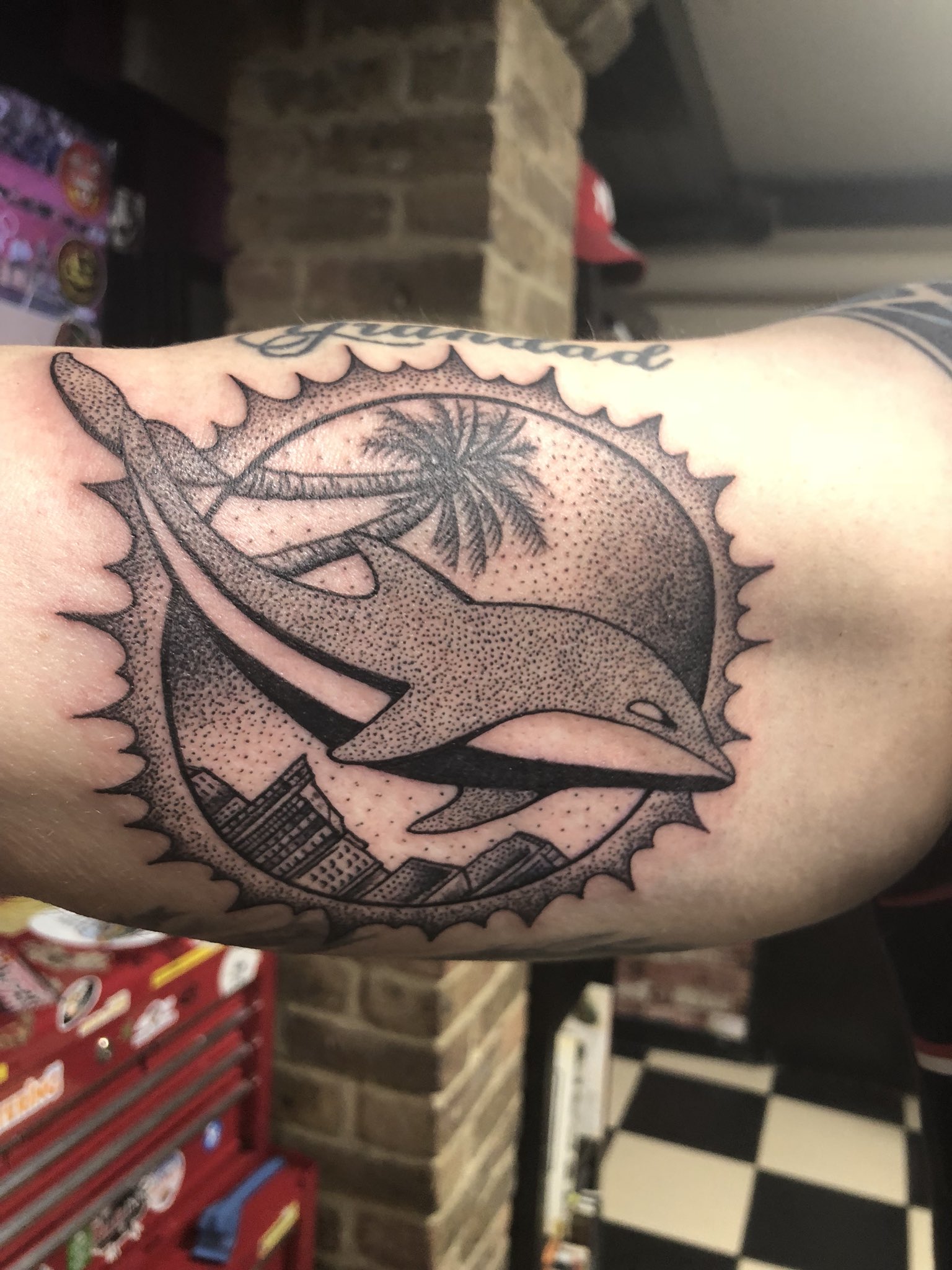 Hyde5 Tannehills new tattoo tribute Wilson lays claim as Dolphins  fastest  Sun Sentinel